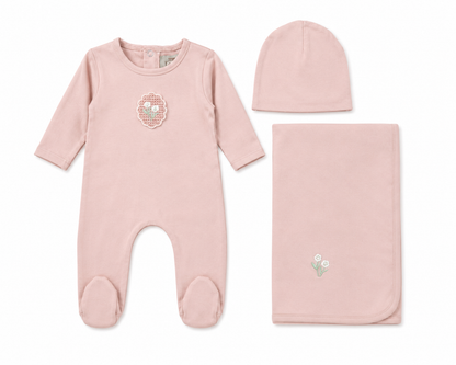 White cotton baby layette set with crochet appliqué detail and bonnet