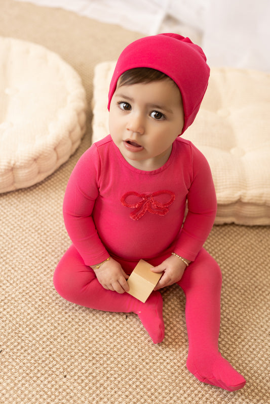 Baby footie with fringe trim detail in soft cotton-spandex by Tricot Bebe