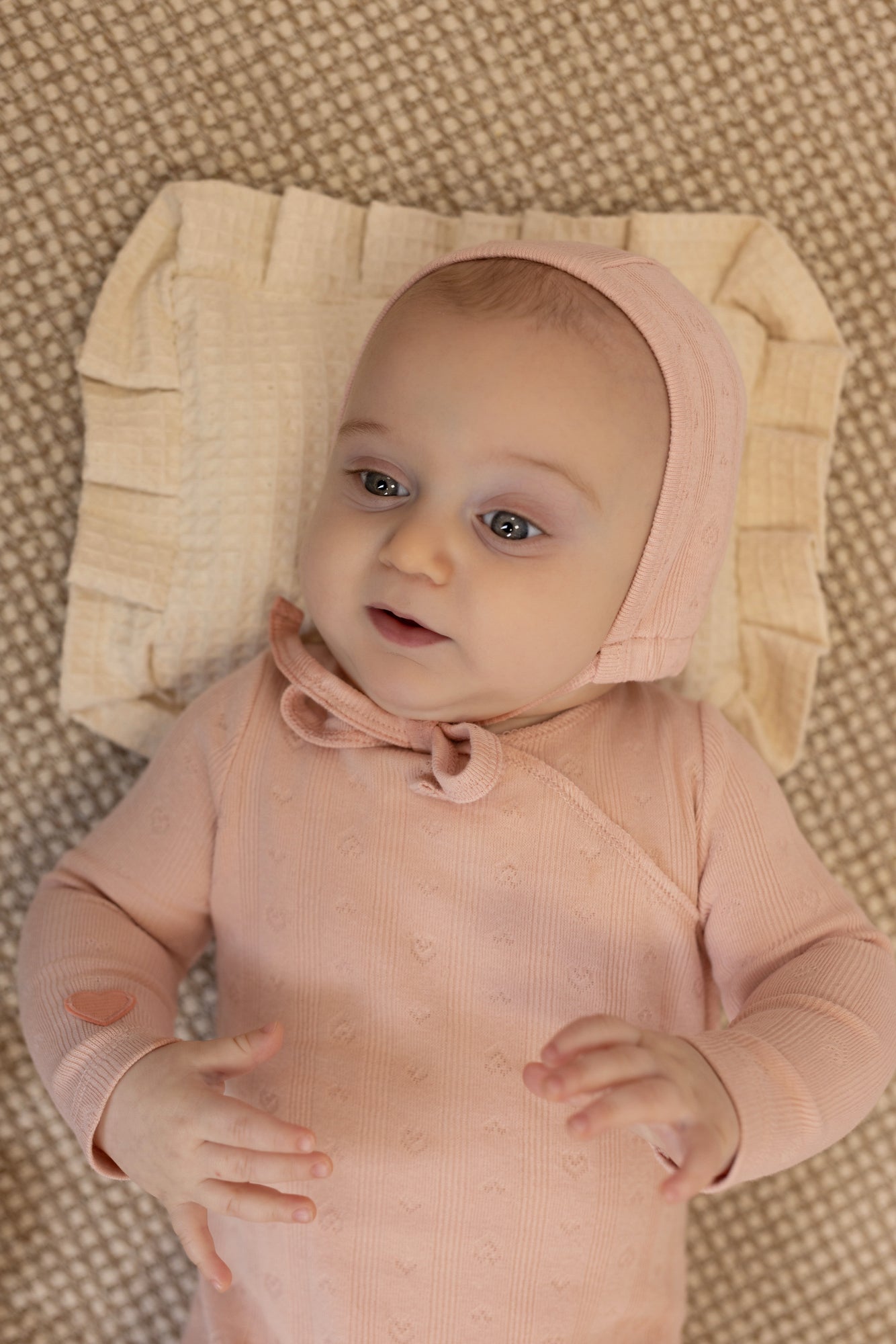 Pointelle kimono baby footie with circle heart cutout detail in cotton-spandex