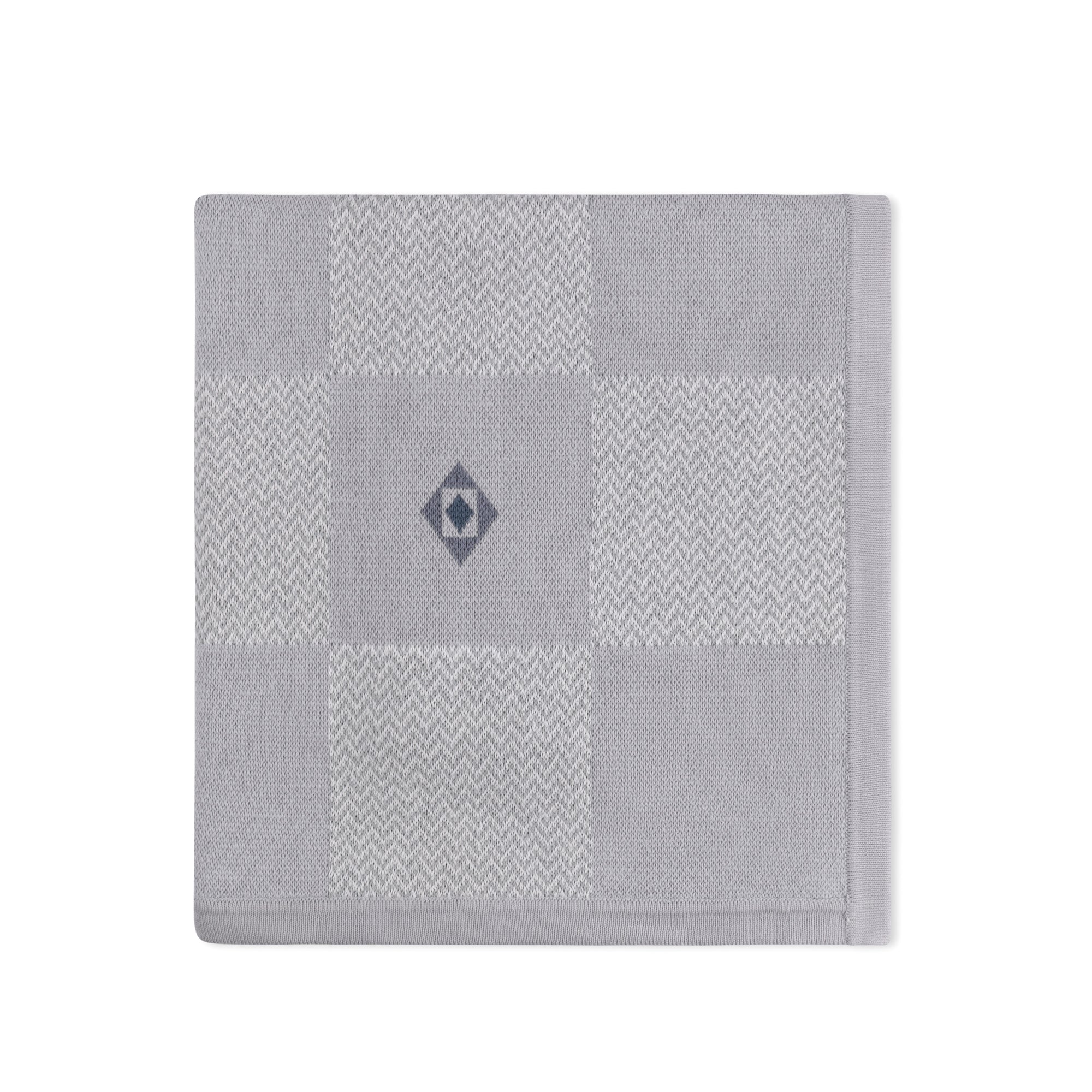 Jacquard knit baby blanket by Tricot Bebe, ideal as a baby shower gift